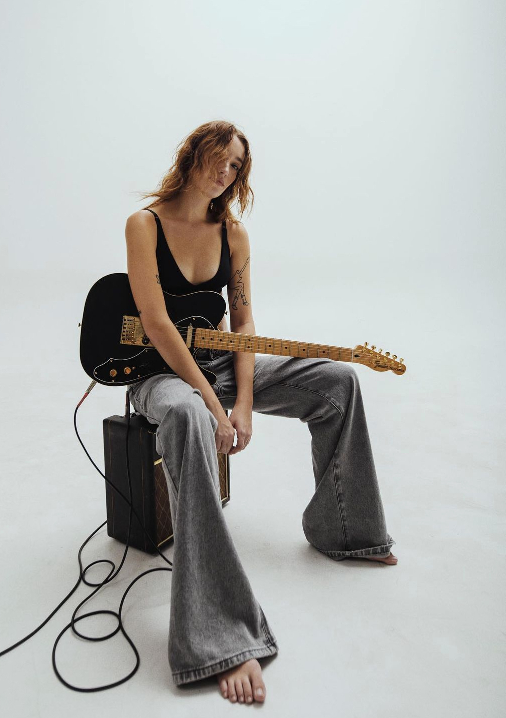 Guitar artist portrait in studio